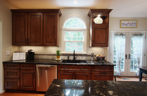 Titanium Granite with Black Accent Maple Allspice Finish Cabinets ,Harlequin Mosaic,Bronze Mix Antique Roma and Arabesquato Brushed Marble Backsplash, Stainless Steel Appliance